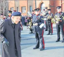  ?? JUANITA MERCER/THE TELEGRAM ?? Rev. Ian Wishart makes his way to the Sergeants’ Memorial on Queen’s Road.