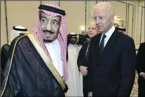  ?? ASSOCIATED PRESS ?? In this Oct. 27, 2011, file photo, then US Vice President Joe Biden (right) offers his condolence­s to then Prince Salman bin Abdel-Aziz upon the death of his brother Saudi Crown Prince Sultan bin Abdul-Aziz Al Saud at Prince Sultan palace in Riyadh, Saudi Arabia.