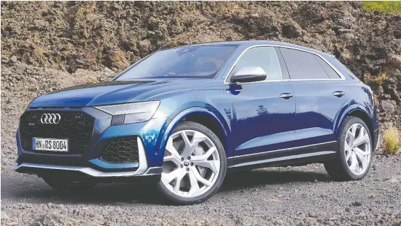  ?? PHOTOS: BRIAN HARPER/DRIVING ?? The 2021 Audi RS Q8 balances a tailored luxury look with the muscularit­y needed to stand out in its segment.