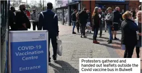  ??  ?? Protesters gathered and handed out leaflets outside the Covid vaccine bus in Bulwell