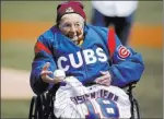  ?? Jim Young ?? The Associated Press Loyola-chicago’s 98-year-old chaplain Sister Jean tosses out a ceremonial pitch prior to the start of the Cubs’ home opener against the Pittsburgh Pirates on Tuesday in Chicago.