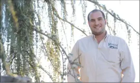  ?? BEA AHBECK/NEWS-SENTINEL ?? Kelton Fleming, pictured at his Duck Creek Nursery on Friday, recently won the Young Farmers and Ranchers Achievemen­t Award.