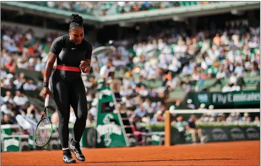  ?? AP/ALESSANDRA TARANTINO ?? Serena Williams celebrates after scoring a point Tuesday during her 7-6 (4), 6-4 victory over Kristyna Pliskova of the Czech Republic in the first round of the French Open at Roland Garros Stadium in Paris.