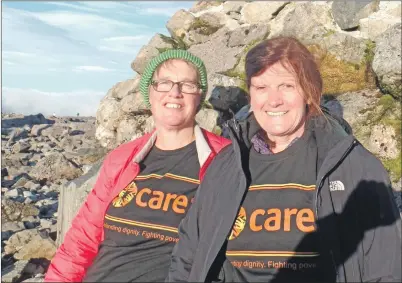  ??  ?? Ruth and Delores at the summit of Ben Nevis.