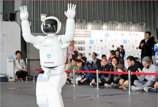  ??  ?? 機器人技術領先全球的­日本，要創造「人機共生、協作」的未來社會。