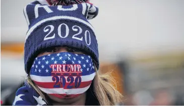  ?? PHOTO: REUTERS ?? Big fan . . . A supporter of United States President Donald Trump waits in line to attend his campaign event at Erie Internatio­nal Airport this week.