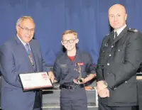  ??  ?? Cadet of the year Leyton Brame receives his award from Mayor of Rossendale, Coun Colin Crawforth
