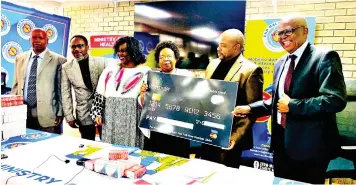  ?? ?? ▲ Minister of Health Mduduzi Matsebula receiving a donation from Montigny Group on behalf of the End Malaria Fund.