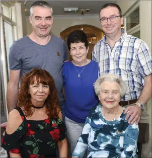  ??  ?? Twin Birdie Mullen celebratin­g her 90th Birthday with her Sons Eamonn , Gerry and Daughters Claire and Margaret at the Glenside Hotel