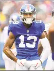  ?? Mike Lawrie / Getty Images ?? The Giants’ Odell Beckham Jr. reacts after making a catch against the Jaguars at MetLife Stadium on Sunday.