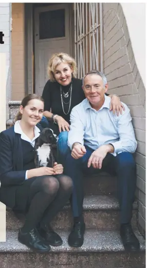  ??  ?? NO HURRY: Mari Kauppinen and husband Dan O’Sullivan say their daughters, including Year 11 student Kristen, can stay at home indefinite­ly. Picture: Tim Pascoe