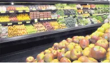  ?? GREG SORBER/JOURNAL ?? La Montañita has responded to member feedback and removed most nonorganic fruits and vegetables from its produce aisles.