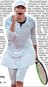  ?? AFP ?? Pole star: a fist pump signals 19-year-old Swiatek’s stunning victory against Halep yesterday