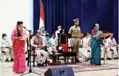 ??  ?? MP governor Anandiben Patel administer­s the oath to BJP’s Yashodhara Raje Scindia as a Cabinet minister at the swearing-in ceremony at Raj Bhavan in Bhopal on Thursday. Chief minister Shivraj Singh Chouhan is also seen.