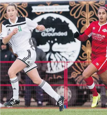  ?? LIAM RICHARDS ?? Saskatchew­an Impact centre back Meagan Manson, left, races past a B.C. Surrey United SC player at the Canadian club soccer championsh­ips at the Umea fields on Wednesday. Games continue all weekend.