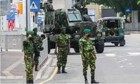  ?? ?? Soldiers at a checkpoint in Colombo on Wednesday. Photograph: Ishara S Kodikara/AFP/ Getty Images