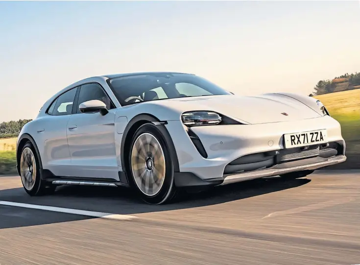  ?? ?? PREMIUM: The Taycan is Porsche’s debut electric car, but the company has nailed it first time, with a car that looks good, packs a powerful punch and handles beautifull­y.