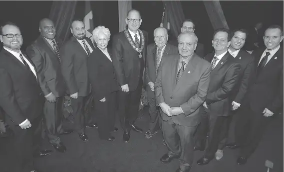  ?? NICK BRANCACCIO/FILES ?? At its inaugural meeting in 2014, members of the newly elected Windsor city council posed for a group photo. From left are Chris Holt, John Elliott, Rino Bortolin, Jo-Anne Gignac, Mayor Drew Dilkens, Hilary Payne, Ed Sleiman, Irek Kusmierczy­k, Paul...