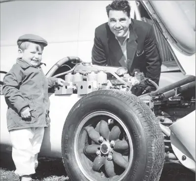  ??  ?? John Cooper with his son, Mike, beside an F2 Cooper in 1959. The company played a key role in Formula One history.