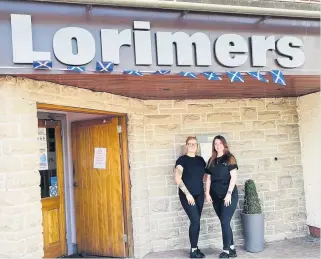  ??  ?? Table battle
Lorimers assistant manager Rachel Hunter, left, and senior barmaid Emma Mitchell