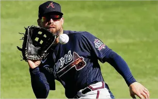  ?? CURTIS COMPTON/CURTIS.COMPTON@AJC.COM ?? Ender Inciarte has won three Gold Gloves and earned an All-star berth, but he’s coming off the weakest season of his career in 2020, appearing in 46 games and hitting .190, and he was left off the Braves’ postseason roster. Now he’s facing an uncertain role with the team.