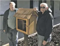  ??  ?? The new Little Free Library was designed, built and installed by Bill Nenninger and Harry VanEvery.