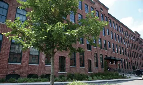  ??  ?? A HELPING HAND: Former mill space will be converted into an additional 87 housing units at Arlington Point in Lawrence, thanks to financing assistance from the state.