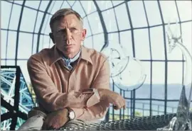  ?? Netf lix
BENOIT BLANC (Daniel Craig) is back sleuthing in the appealing “Glass Onion.” ??