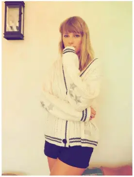  ??  ?? Taylor Swift in her signature cardigan Photograph: TAS Rights Management