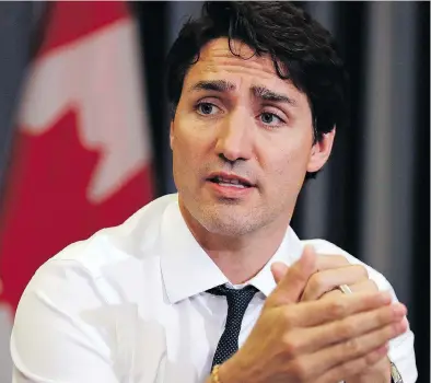  ?? CHARLES KRUPA / THE ASSOCIATED PRESS ?? Justin Trudeau’s government vastly overestima­tes the power of “our example to the world,” Rex Murphy writes.