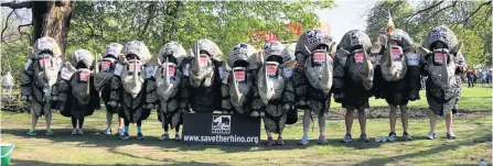  ??  ?? A team of four wearing rhino costumes will pass through Bath as they take part in the virtual London Marathon