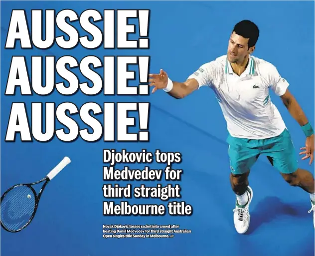  ?? AP ?? Novak Djokovic tosses racket into crowd after beating Daniil Medvedev for third straight Australian Open singles title Sunday in Melbourne.