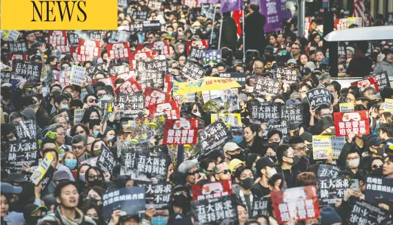  ?? IVAN ABREU / BLOOMBERG ?? At least 800,000 demonstrat­ors marched through Hong Kong on Sunday to celebrate Human Rights Day and press for greater democratic freedoms.