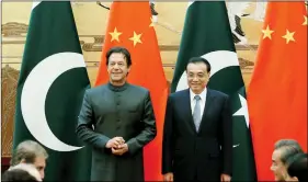  ?? REUTERS ?? China’s Premier Li Keqiang and Pakistani Prime Minister Imran Khan attend a signing ceremony at the Great Hall of the People in Beijing, China, on 3 November 2018.