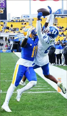  ?? Joe Sargent/Getty Images ?? Pitt’s Bangally Kamara, left, breaks up a pass in the end intended for Duke’s Jordan Moore. zone