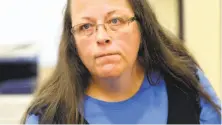  ?? Timothy D. Easley / Associated Press ?? Rowan County Clerk Kim Davis invoked “God’s authority” as she defied the U.S. Supreme Court on same-sex marriage.