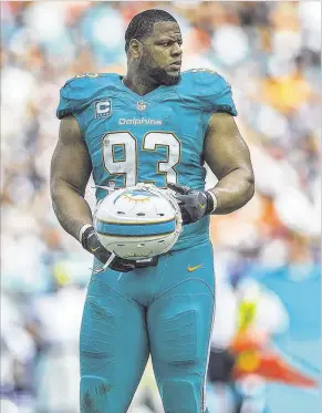  ?? AL BELLO / GETTY IMAGES ?? Ndamukong Suh is the undisputed leader of the Dolphins’ defensive front as one of the NFL’s most ferocious tacklers. He’ll mentor several young talents alongside him.