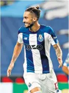  ??  ?? Target: Manchester United are in talks about signing left-back Alex Telles from Porto