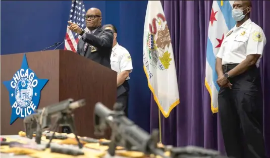  ?? ASHLEE REZIN GARCIA/SUN-TIMES ?? Chicago Police Supt. David Brown speaks about the city’s violent weekend Monday in front of a table of guns police say they confiscate­d.