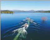  ?? CHEN ZHENHAI / FOR CHINA DAILY ?? Officers patrol Beijing’s Miyun Reservoir last year.