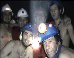  ?? OFICCIAL TV MINISTERY MINE/AFP ?? Chilean miners pose inside the San Jose Mine near Copiapo, 800km north of Santiago, Chile.