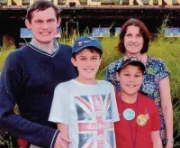  ??  ?? ●● Christophe­r with his parents Gill and Richard and brother Jack