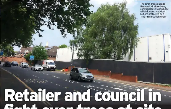  ??  ?? The birch trees outside the new Lidl store being constructe­d in Sinfin Lane which it wants cut down but are protected by a Tree Preservati­on Order