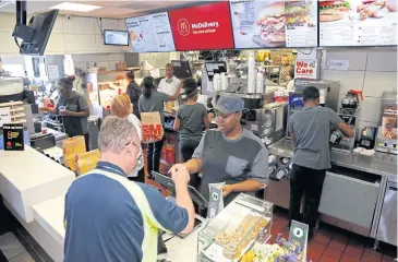  ?? AP ?? McDonald’s Corp, which had originally planned to update most of its free-standing US locations by 2020, is now giving its franchises until the end of 2022 to do renovation­s.