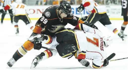  ?? Stephen Dunn / Getty Images ?? Matt Beleskey, left, was an overtime hero for the Ducks in the playoffs. There are plenty of examples that indicate teams
should steer clear of a player who has a breakout season just as he is becoming an unrestrict­ed free agent.