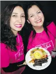  ??  ?? Tayybeh organizati­on founder Nihal Elwan and Rawa Mahouk displays the cuisine that helps Syrian women settle down in Canada.