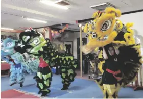  ?? PHOTO COURTESY CALEXICO MARTIAL ARTS ACADEMY ?? Calexico Martial Arts Academy lion dancers perform during the Calexico Martial Arts Academy party in the 2023 Lunar New Year, in Calexico.