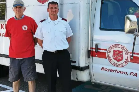  ?? PHOTOS BY REBECCA BLANCHARD — DIGITAL FIRST MEDIA ?? Volunteer Russ Phillips and Boyertown Salvation Army Lt. Joseph Smith on Monday, Sept. 11, the day before their two week deployment to Florida. Missing from photo is volunteer James Hartman.