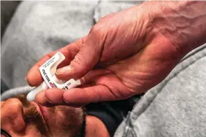  ?? The Associated Press ?? Attendees practice administer­ing Narcan during an overdose education and Narcan training class on Dec. 13, 2021, at the Onala Recovery Center on the South Shore of Pittsburgh.