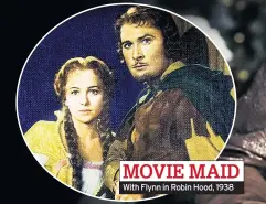  ??  ?? MOVIE MAID With Flynn in Robin Hood, 1938